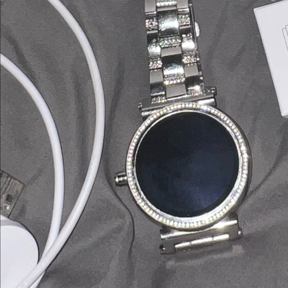 Gently used Michael Kors watch for any device